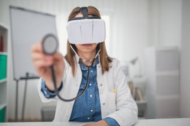 Female doctor wearing virtual reality headset and listening with stethoscope